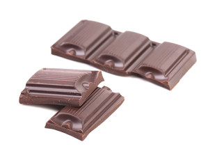 Dark chocolate bars isolated on white background