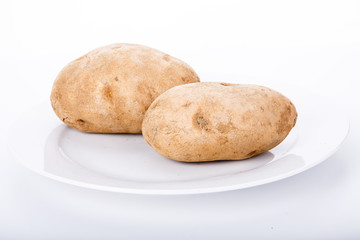 Two Hot Baked Potatoes on White Plate