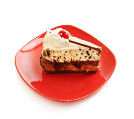 Chocolate cake on red dish