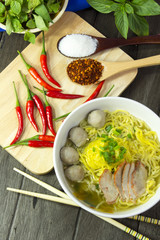Yellow noodles delicious on wood floors