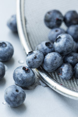 Blueberries in strainer, selective focus