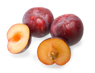 Plums on white background