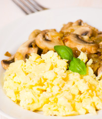 scrambled eggs with champignon mushrooms