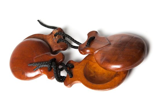 Castanets on white background