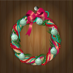 christmas wreath on wooden texture