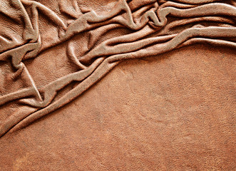 Leather with draped folds