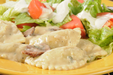 Chicken portabella ravioli with salad