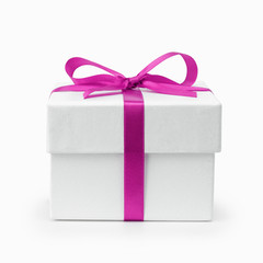 white textured gift box with purple ribbon bow
