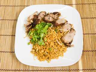 Duck noodle on bamboo background