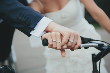 Rings on hands of the newlyweds