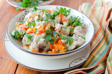 Rabbit stew with vegetables and sour cream