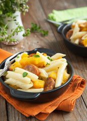 Pasta with cream sauce, italian sausage and pumpkin