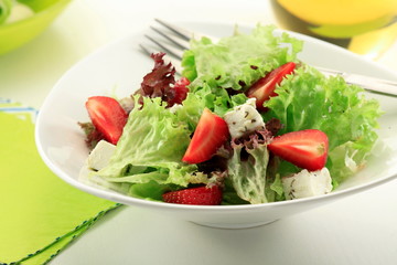 Mixed green salad with lollo Bionda and fresh strawberries