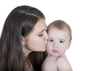 mother kissing her child