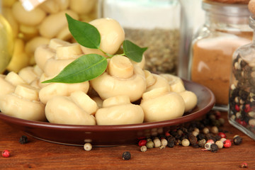 Composition of delicious marinated mushrooms, oil and spices