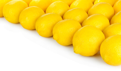 Ripe lemons on white background