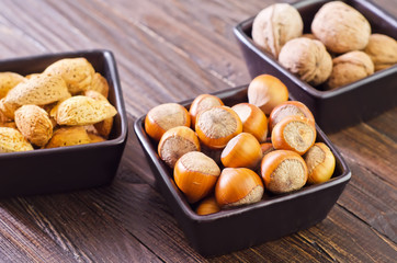 nuts in the black bowls