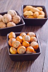 nuts in the black bowls