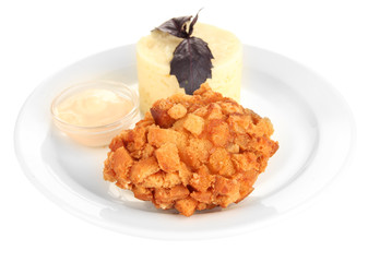 Chicken Kiev  and mashed potatoes on plate, isolated on white