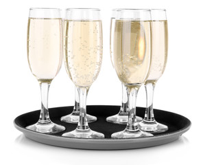 Many glasses of champagne on the tray, isolated on white