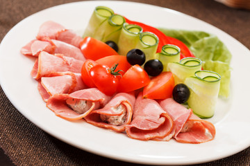 Meat appetizer with vegetables