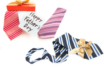 Obraz premium Happy Fathers Day tag with gift boxes and tie