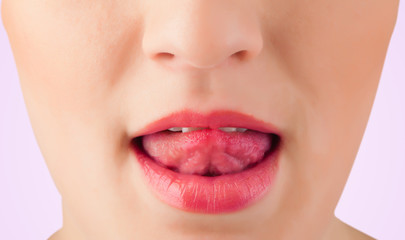 Fototapeta premium Beautiful woman red lips close up