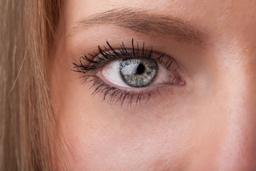 Fototapeta premium Portrait of a pretty girl close up eye
