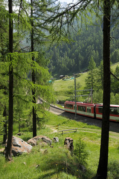 Glacier Express Train Near Zermatt In Swiss Alps