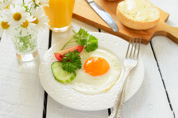Healthy breakfast: fried egg and buns