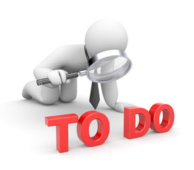 Businessman examines something