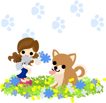 可愛い犬に花束をプレゼントする少女