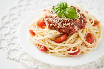 Pasta with tomato sauce, tomatoes and cheese
