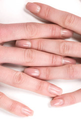 Manicure. Close-up of female fingers isolated on white