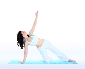 young woman in yoga pose on isolated