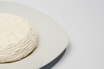 cheese on a white plate