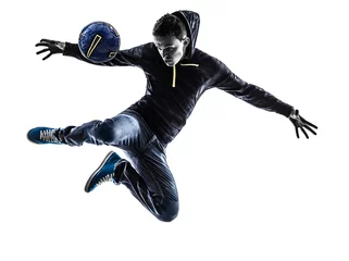 Fototapeten young man soccer freestyler player silhouette © snaptitude