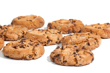 Some delicious chocolate cookies isolated on white background