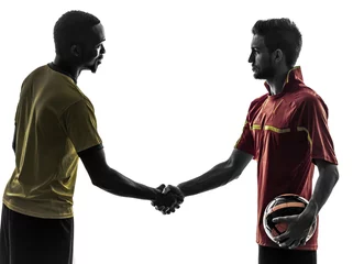Fototapeten two men soccer player  handshake handshaking silhouette © snaptitude