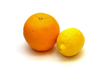 Orange and lemon on white background