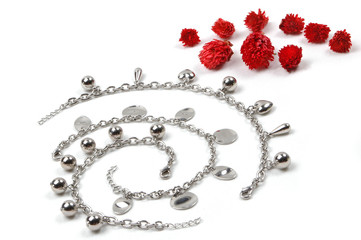 costume jewerly and red flowers - 55693522