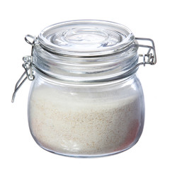 semolina in glass jar isolated