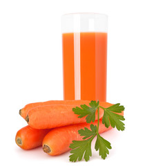 Carrot juice glass and carrot tubers