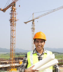 Portrait of construction worker at construction site