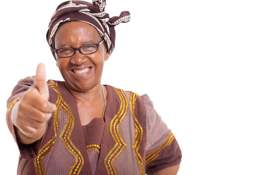 mature african woman with happy smile giving thumbs up
