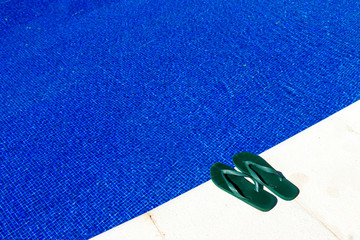 Swimming pool with flip-flops