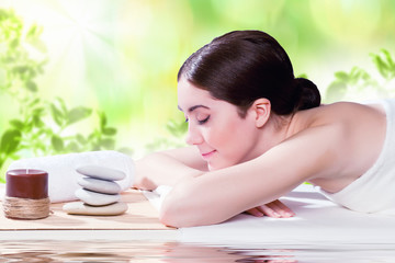 Obraz na płótnie Canvas Girl at spa massage
