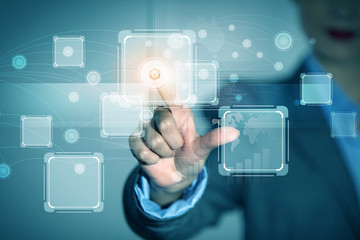 Businessman touching icon