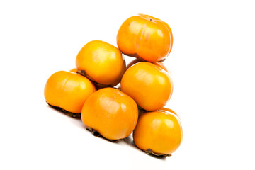 Pyramid of ripe persimmons