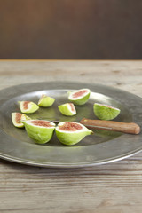 green fresh figs in a plate